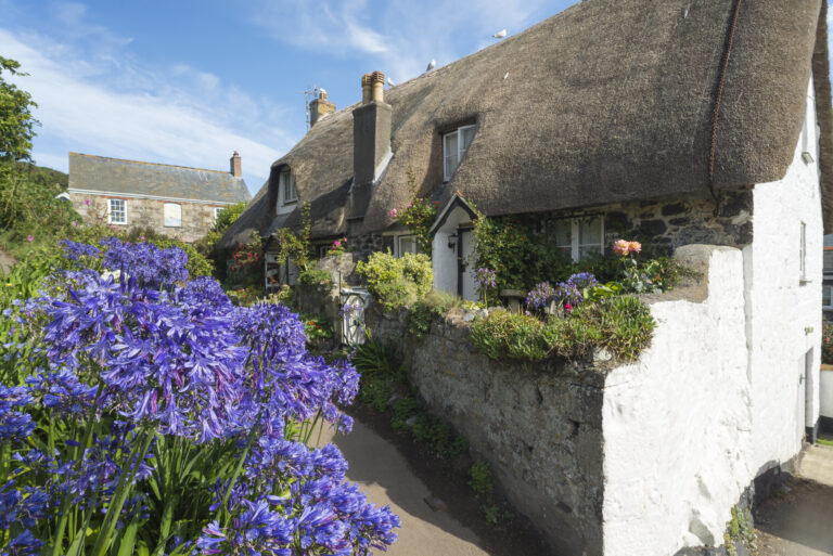 Little house with flowers on the South West Coast Path