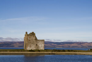 Lochranza and its picturesque castle on a sunny day on the Isle of Arran, Scotland