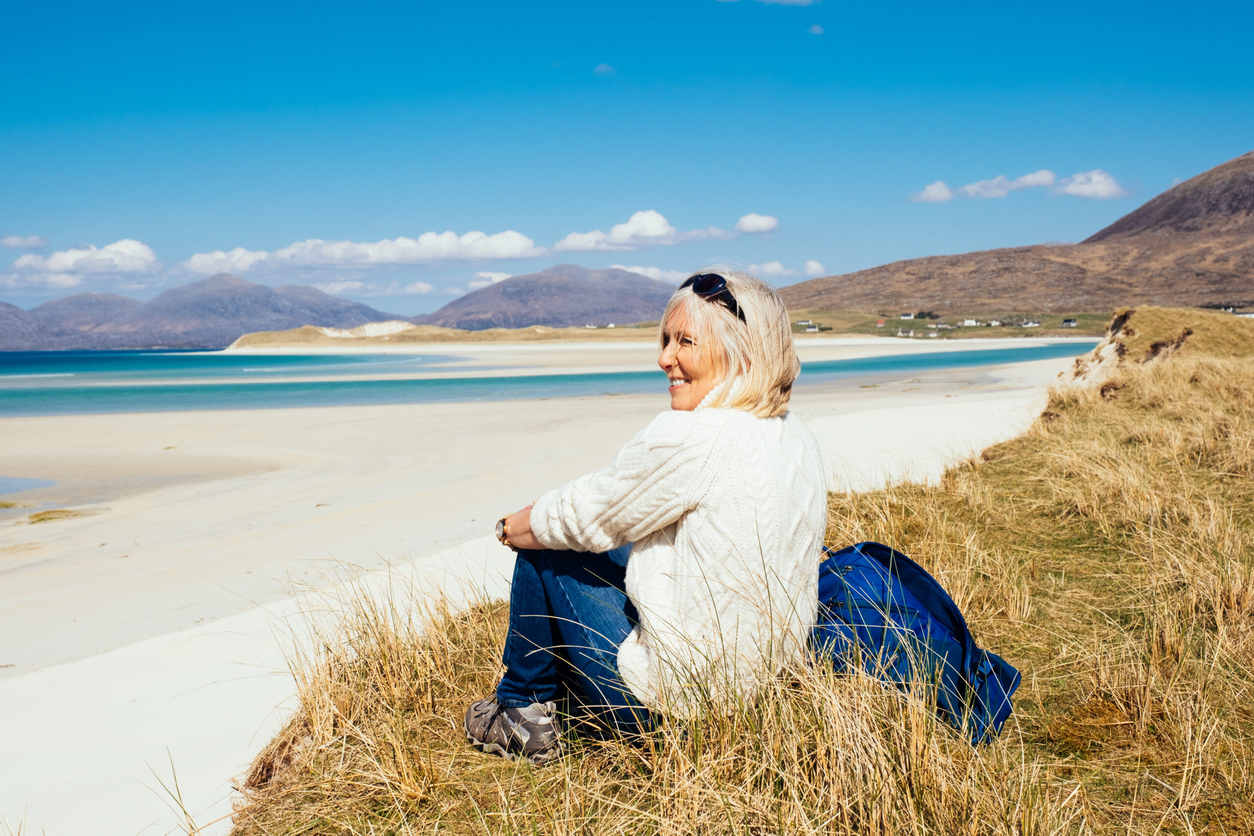 Resting on the dunes after a fantastic coastal walk in the Outer Hebrides, North West Scotland